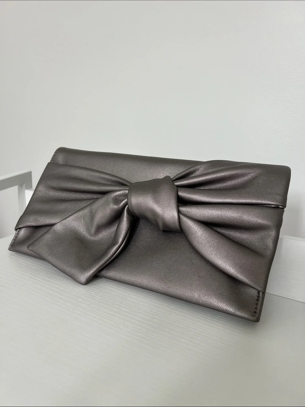 INC International Concepts | Elegant Metallic Charcoal Bow Clutch Size 11